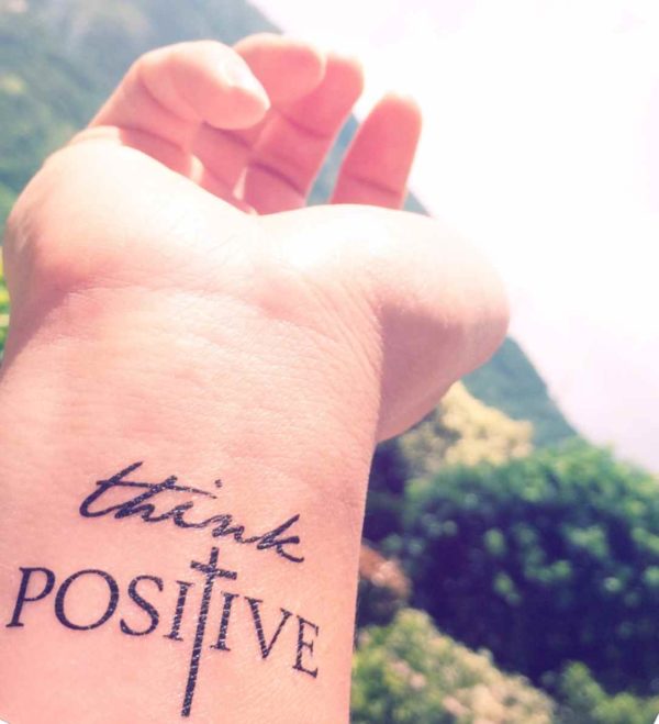 Think positive wrist tattoo