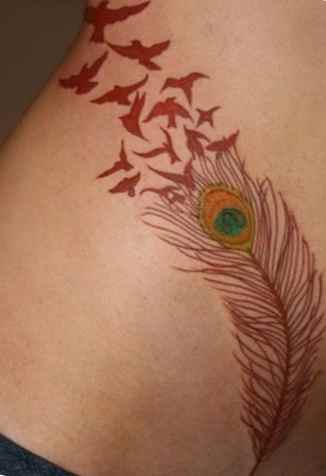 Birds flying feather tattoo