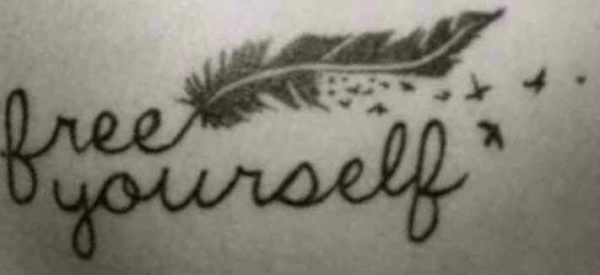 Feather tattoo with quote