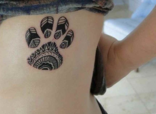 Black and white dog tattoo