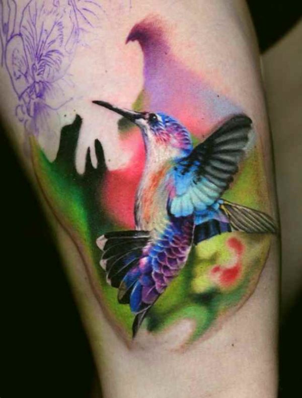 Colorful hummingbird tattoo