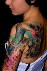 Side hummingbird tattoos on shoulder