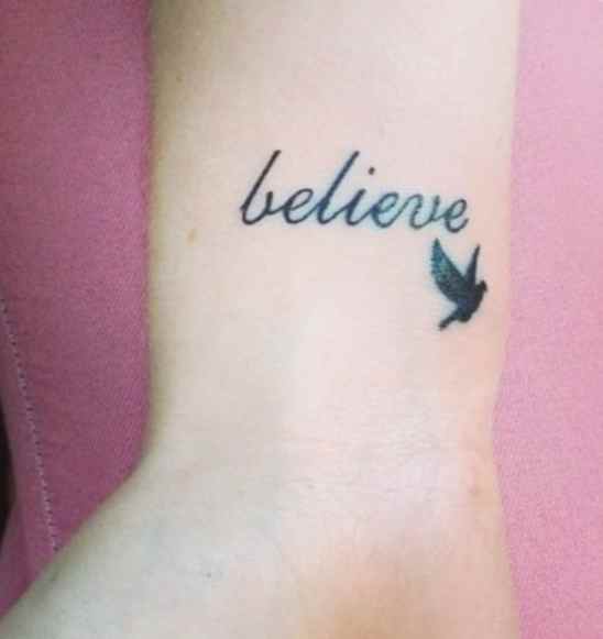 Wrist bird believe tattoo