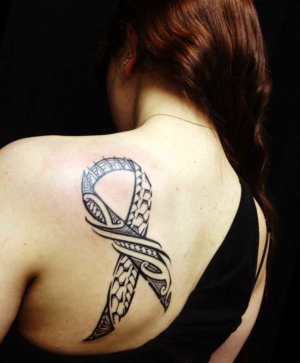 Breast cancer ribbon tribal tattoo