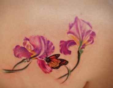 Butterfly tattoo design with flowers