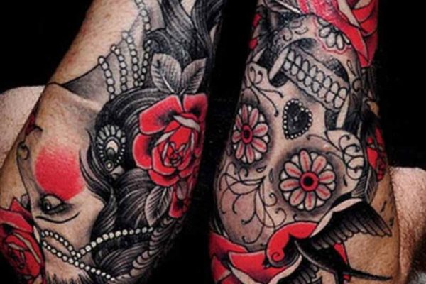 Candy skull sleeve tattoo
