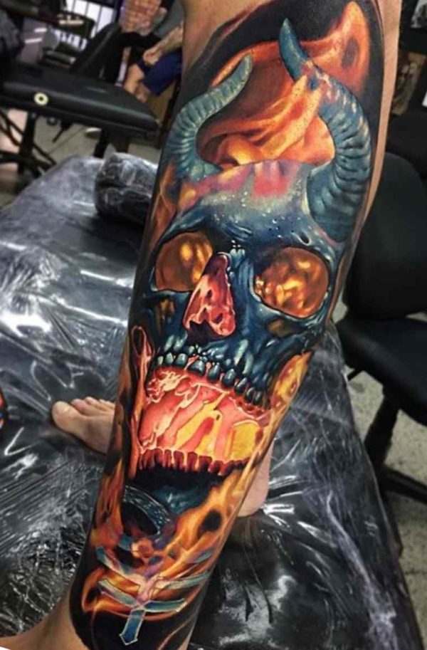 Crazy skull sleeve tattoo