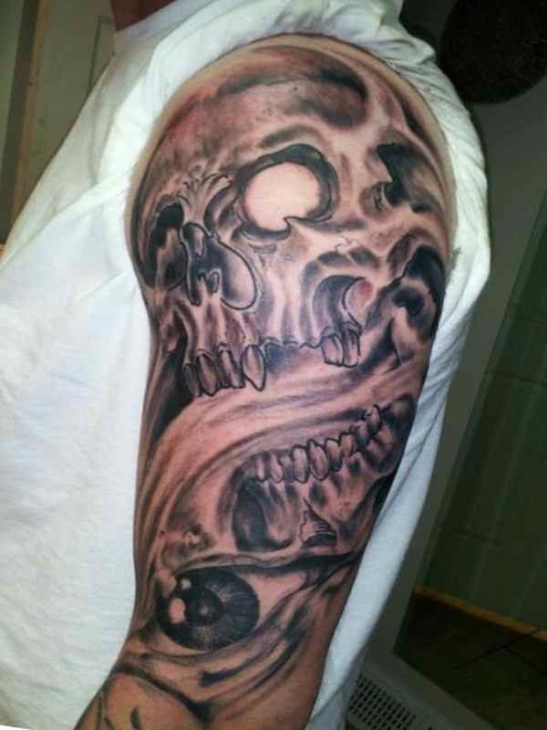 Evil skull sleeve tattoos