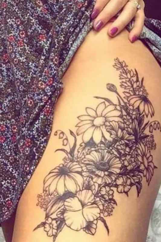 Flower tattoo designs thigh