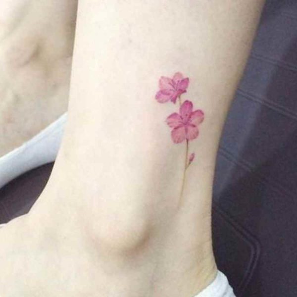 Very small flower tattoo designs