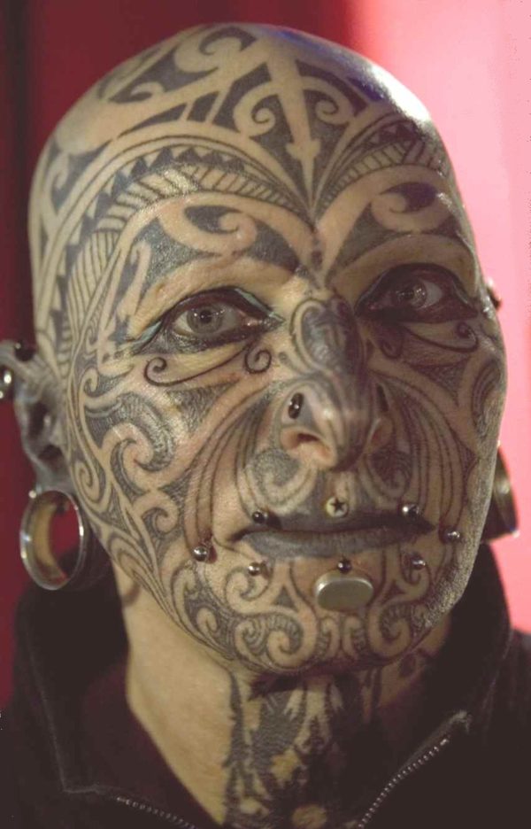 Sick Tribal tattoo for face