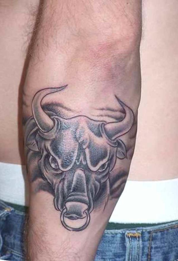 Bull tattoo back of arm