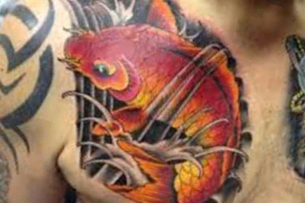 Koi fish tattoo chest