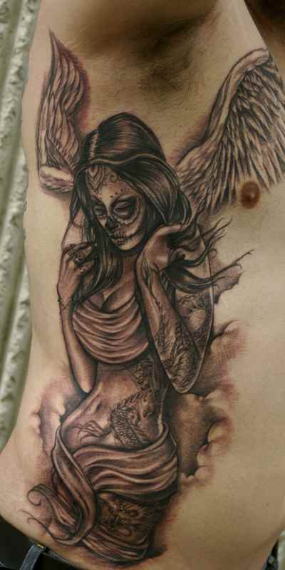 Dead man angel tattoo