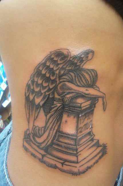 Angel tattoo of grief