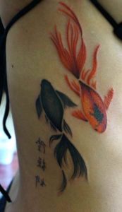 Fish dual koi tattoo