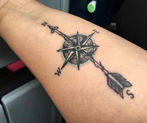 Arrow and compass tattoo
