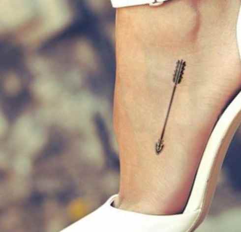 Arrow tattoo on foot