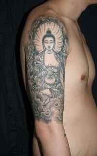 Buddha tattoo andy shou meaning