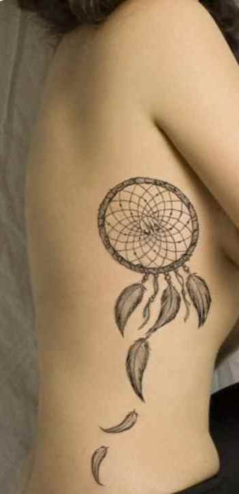 Dreamcatcher tattoo on the side