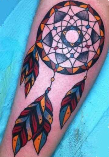 Dreamcatcher tattoo on his arm