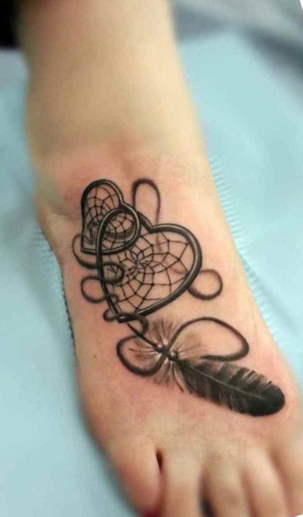 Dreamcatcher tattoo in foot