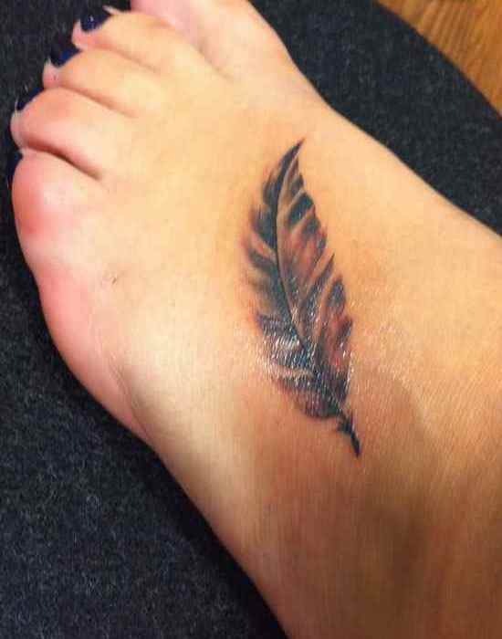Top of the foot badger tattoo
