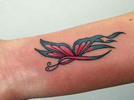 Pink ribbon butterfly tattoo