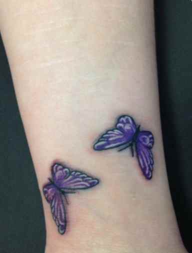 Purple butterfly tattoo design