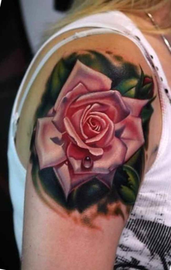 Small water droplets and rose tattoo