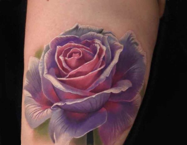 Wonderful looking rose tattoo