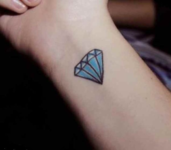 Small crystal wrist tattoo