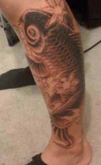 Koi fish tattoo on calf