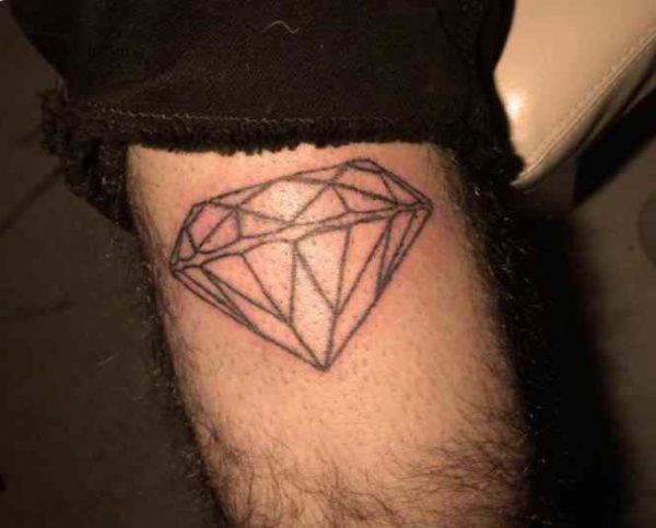 Diamond rapper tattoo