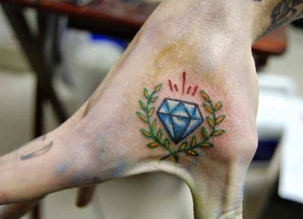 Tattoo diamond on the hand