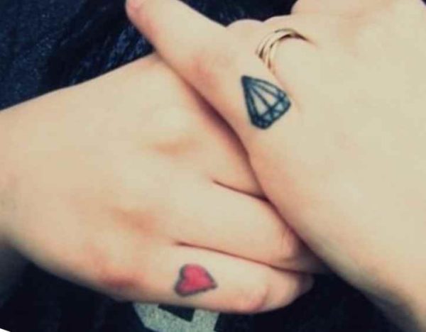 Diamond tattoo on finger