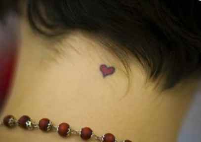 Cute tattoo with a red heart