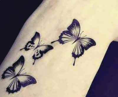 Butterfly tattoo on wrist