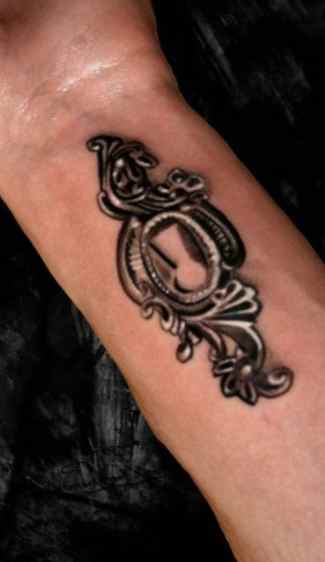 Keyhole wrist tattoo