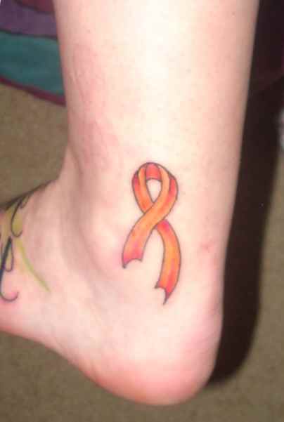 Ribbon tattoo on the ankle