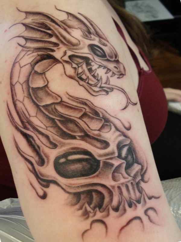 Dragon and skull sleeve tattoo