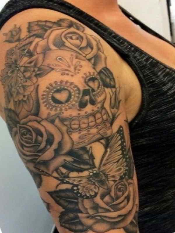 Rose and skull sleeve tattoo
