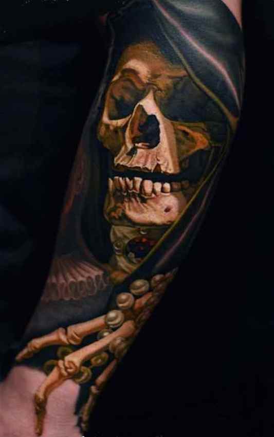 Skull and bones sleeve tattoo