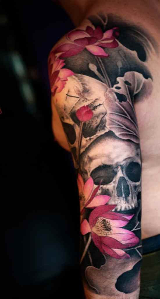 Skull flower sleeve tattoo