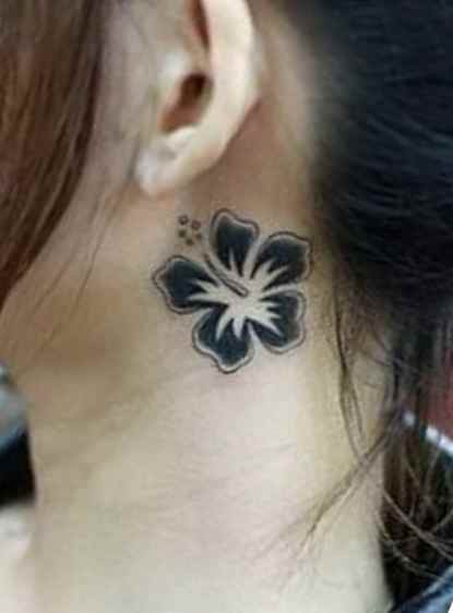 Flower tattoo behind ear