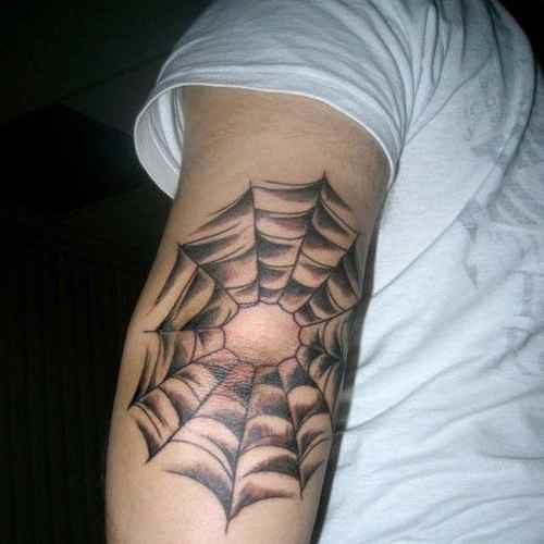 Spider web tattoo on elbow by jared