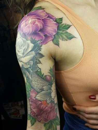 Flower quarter sleeve tattoo