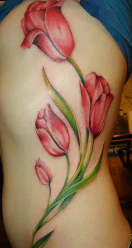 Flower rib cage tattoo