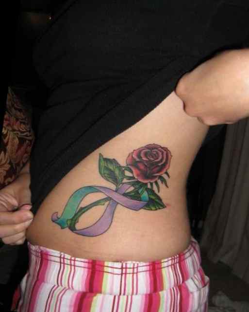 Flower ribbon tattoo