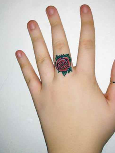 Flower ring tattoo